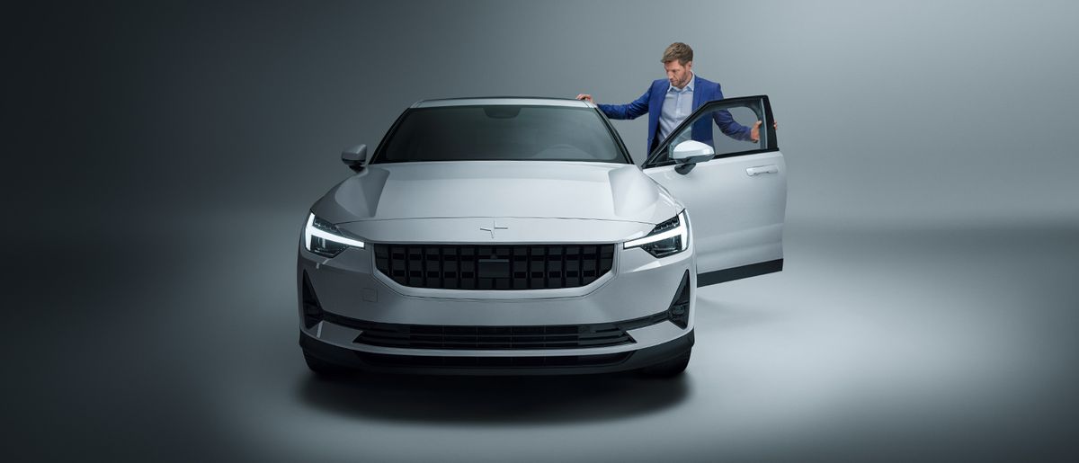 A person gets into a Polestar company car